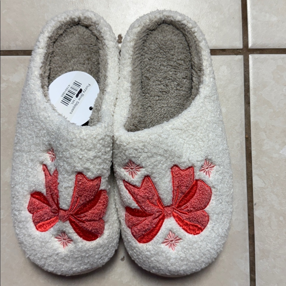 Cozy White Slippers with Red Bow Design